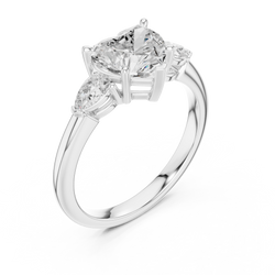 Bridal Heart Cut Lab Grown Diamond Engagement Ring 2.50 — Top-down view of the bridal heart cut lab grown diamond engagement ring in classic 14k yellow gold showcasing the warm gold prongs hugging the heart cut center stone and brilliant side pear accents on a polished plain metal band.