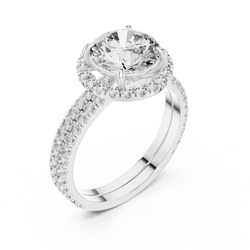 Detail photo focusing on the micro pave U-cut diamond shank band design of the 10K and 14K solid gold halo promise ring, showing seamless diamond placement and polished finish.