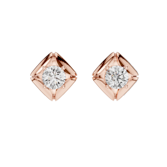 Rose gold diamond earrings on a white background