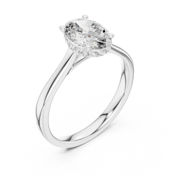 Luxurious velvet gift box presentation view showcasing the 14k gold oval diamond ring sparkling under warm studio light ready for an anniversary gift or romantic wedding proposal