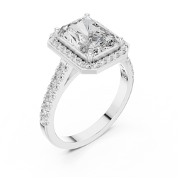 Macro detail of u-cut pave diamond band with 14 round brilliant accent diamonds running halfway along the solid gold ring shank for women engagement.