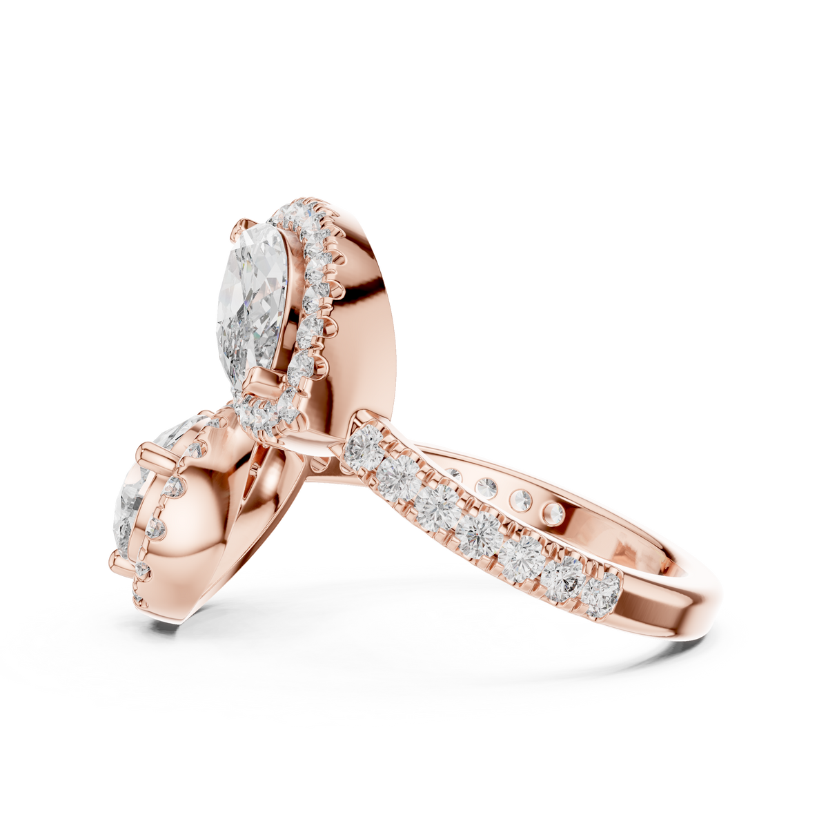 Macro side profile shot focusing on the delicate collet basket design and U cut pave setting along the bypass shank of a 14K Gold Two Stone Lab Diamond Engagement Ring designed by HB Prestige Jewels