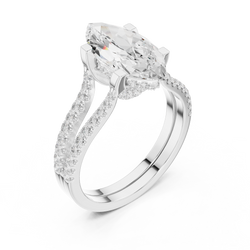 On hand model perspective of women 14K gold marquise lab diamond engagement ring demonstrating scale finger fit and elegant split shank pave band presence for everyday luxury wear.