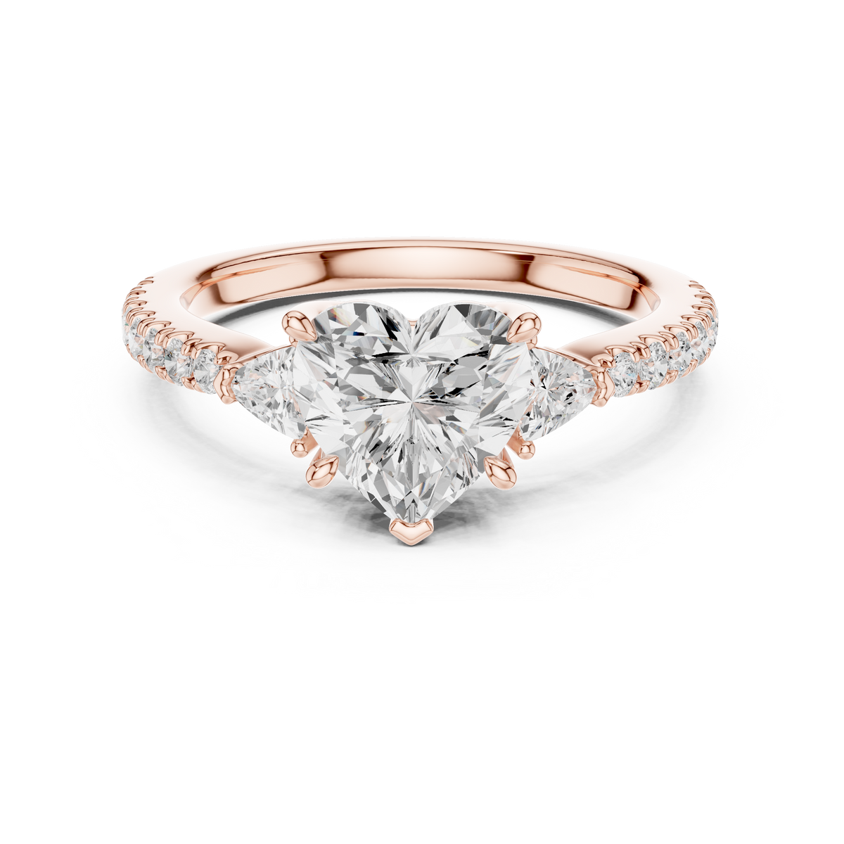 14K Gold Lab Diamond Ring front studio view showcasing a stunning 1.50 Ct heart cut center lab grown diamond flanked by two brilliant trillion side stones and a micro pave set gold band, created for romantic engagement rings and special anniversary gift collections.

