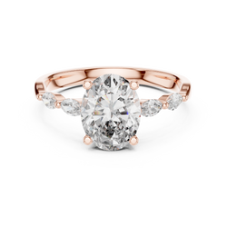 14K gold oval lab grown diamond engagement ring main studio view showing the brilliant center stone and marquise accent diamonds on a clean white background for high quality display

