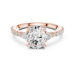Angle 1 Front Studio View: Elegant 14K Gold Lab Diamond 3 Stone Engagement Ring showcasing a 1.72 Carat Oval Cut center lab grown diamond paired with brilliant trillion cut side stones and u cut pave micro diamonds along the solid gold band, perfectly captured under bright studio light.