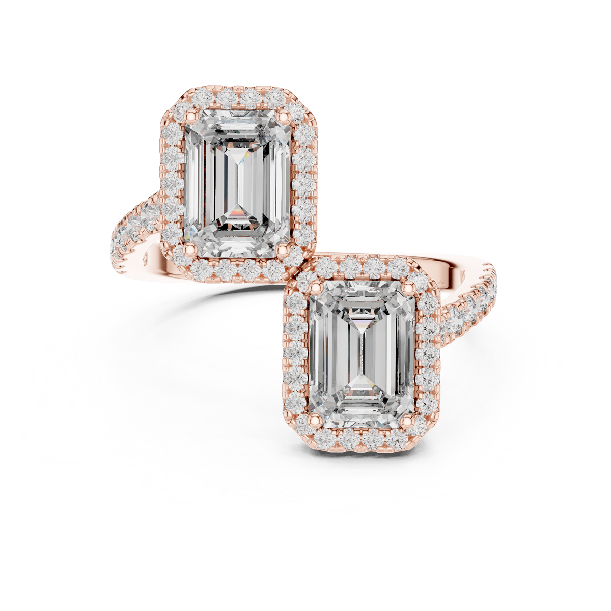 Angle 1 Main Studio View showing 14K Gold Lab Diamond Toi et Moi Ring featuring two sparkling 7x5mm emerald cut center stones surrounded by diamond halos set on a paved bypass yellow gold band against a soft white studio background for maximum sparkle and high-end elegance.


