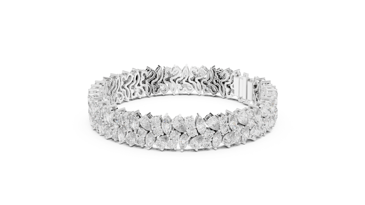Angle 8 Stacked Style View showing this diamond tennis cuff stacked alongside fine gold bangles for a luxurious wrist stack