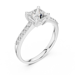 Angled studio display of the princess cut engagement ring resting inside a velvet presentation gift box, highlighting the contrast between polished gold metal and radiant lab grown diamond facets. Great option for romantic marriage proposals and memorable holiday gifts.

