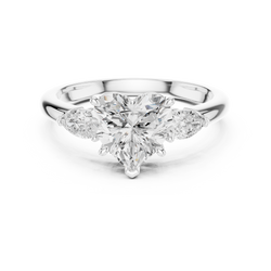 Bridal Heart Cut Lab Grown Diamond Engagement Ring 2.50 — Direct top-down view of the bridal heart cut lab grown diamond engagement ring rendered in brilliant white gold, highlighting the icy white sparkle of the central heart diamond and flanking pear accent stones in a multi-prong solitaire framework.