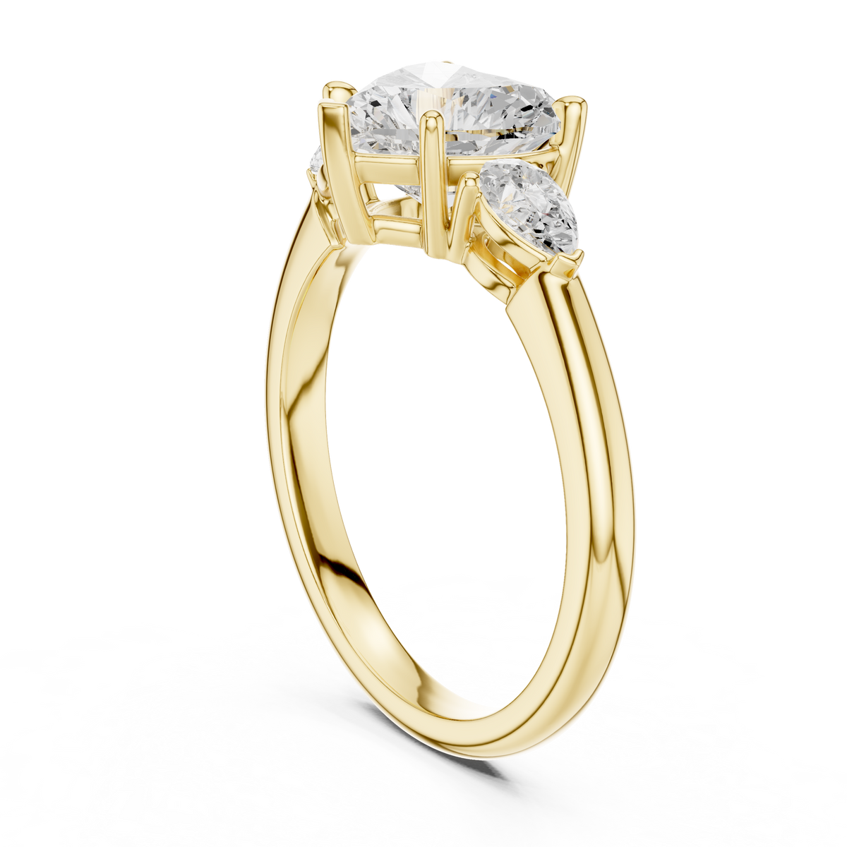 Bridal Heart Cut Lab Grown Diamond Engagement Ring 2.50 — Side profile view of the bridal heart cut lab grown diamond engagement ring in radiant yellow gold showing the open basket gallery allowing light transmission into the heart and pear diamond facets, photographed for the Bridal Heart Cut Lab Grown Diamond Engagement Ring, 2.50 Carat Three Stone Pear Side Accents in 14K Gold Prong Setting Cus