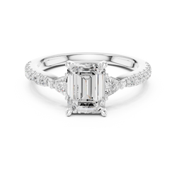 Detailed shot of the pave band setting showing the precisely set round diamonds along the gold shank of the engagement ring