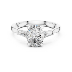 Detailed top down view showcasing the perfect symmetry of the 8.00x6.00 mm oval lab diamond flank by two 5.00x2.50 mm custom baguette side stones on a solid 10k or 14k gold band

