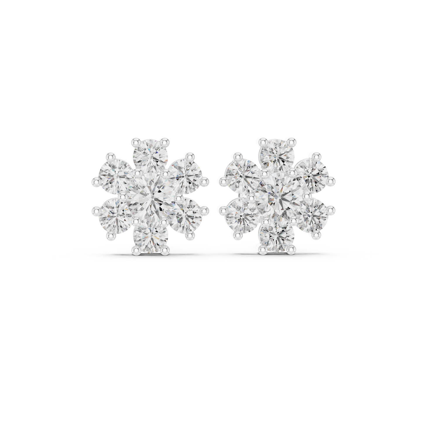 Handheld perspective showing the scale of the floral lab grown diamond cluster earrings on a model. These 14K gold flower studs provide the perfect balance of luxury and simplicity for any outfit. High search volume bridal and engagement accessory style.