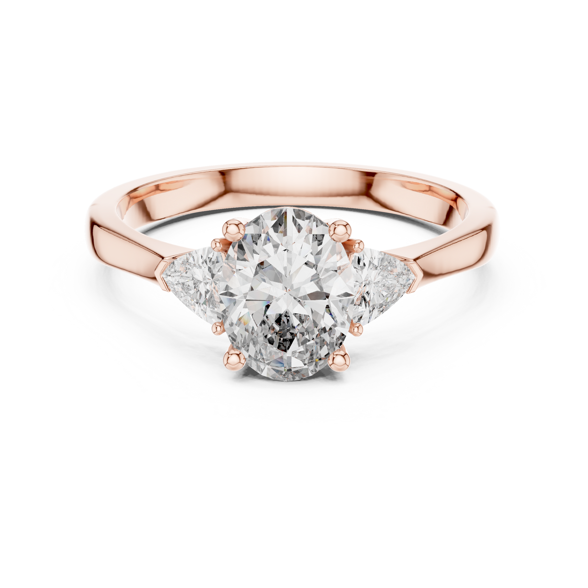 High resolution main studio view of a 14K Gold Lab Diamond Ring featuring a brilliant 1 carat oval cut center stone flanked by two trillion side diamonds in a classic three stone collet setting. Perfect eco friendly oval engagement ring for women shopping on Etsy.