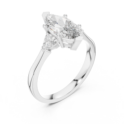 Luxury dark velvet gift box display showcasing the premium presentation of the HB Prestige Jewels three stone Marquise lab diamond engagement ring.

