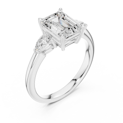 Luxury velvet ring gift box presentation containing a handcrafted 14K solid gold emerald cut lab grown diamond 3 stone ring designed as a timeless anniversary gift for her.