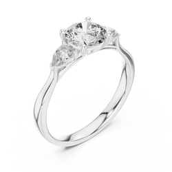 Luxury velvet ring gift box presentation with the 14k gold three stone lab grown diamond bridal ring sparkling brightly under soft warm studio illumination perfect for romantic gift inspiration.