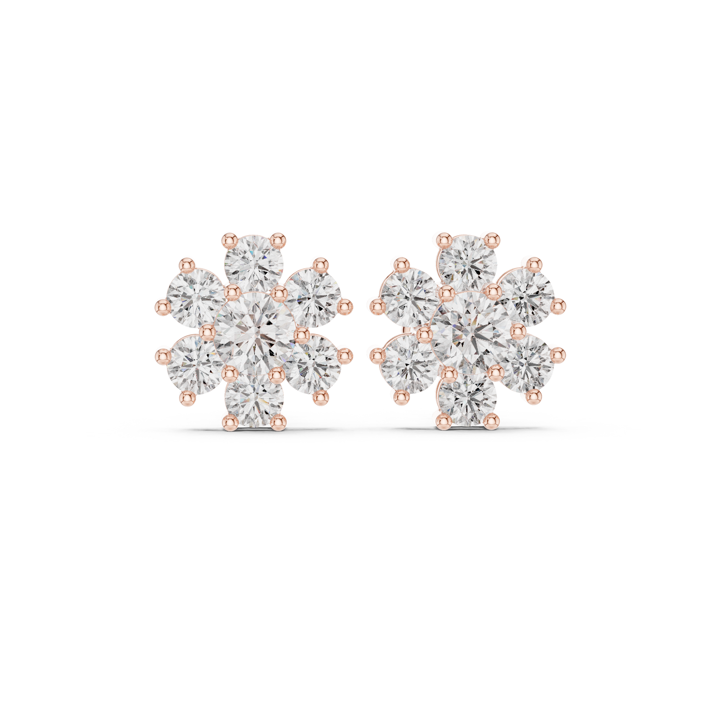 Macro close up view of the floral diamond stud earrings showing the precision of the collet setting and the clear luster of the center lab grown diamonds. These 14K gold flower earrings are handcrafted for perfection and represent the finest in fine jewelry.