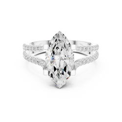 Macro detailed shot highlighting the hidden halo bridge under gallery paved with round lab diamonds supporting a high clarity marquise cut diamond center stone in premium gold band.

