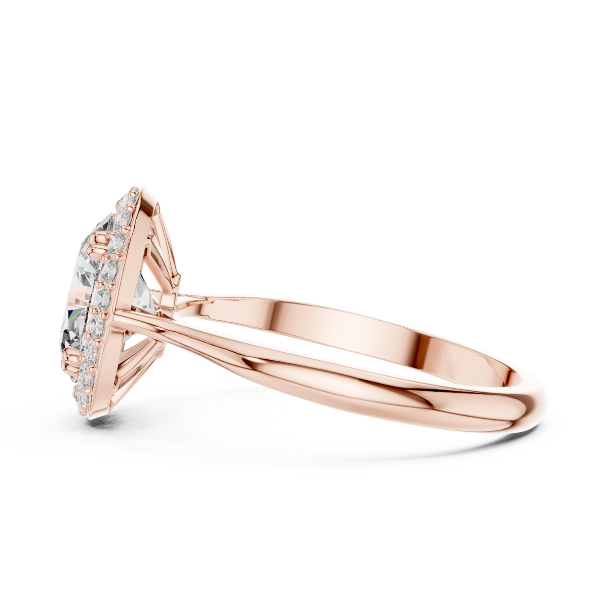 Oval Halo Engagement Ring Oval Cut Lab Grown Diamond 1.00Ct — Side profile view of the rose gold oval halo engagement ring resting on a white surface, highlighting the elevated basket setting, delicate gallery wirework, and comfortable band contour of this classic vintage inspired ring.