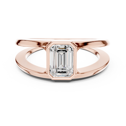 Architectural emerald cut diamond ring sculpted with bold split shank Silver elegance.
