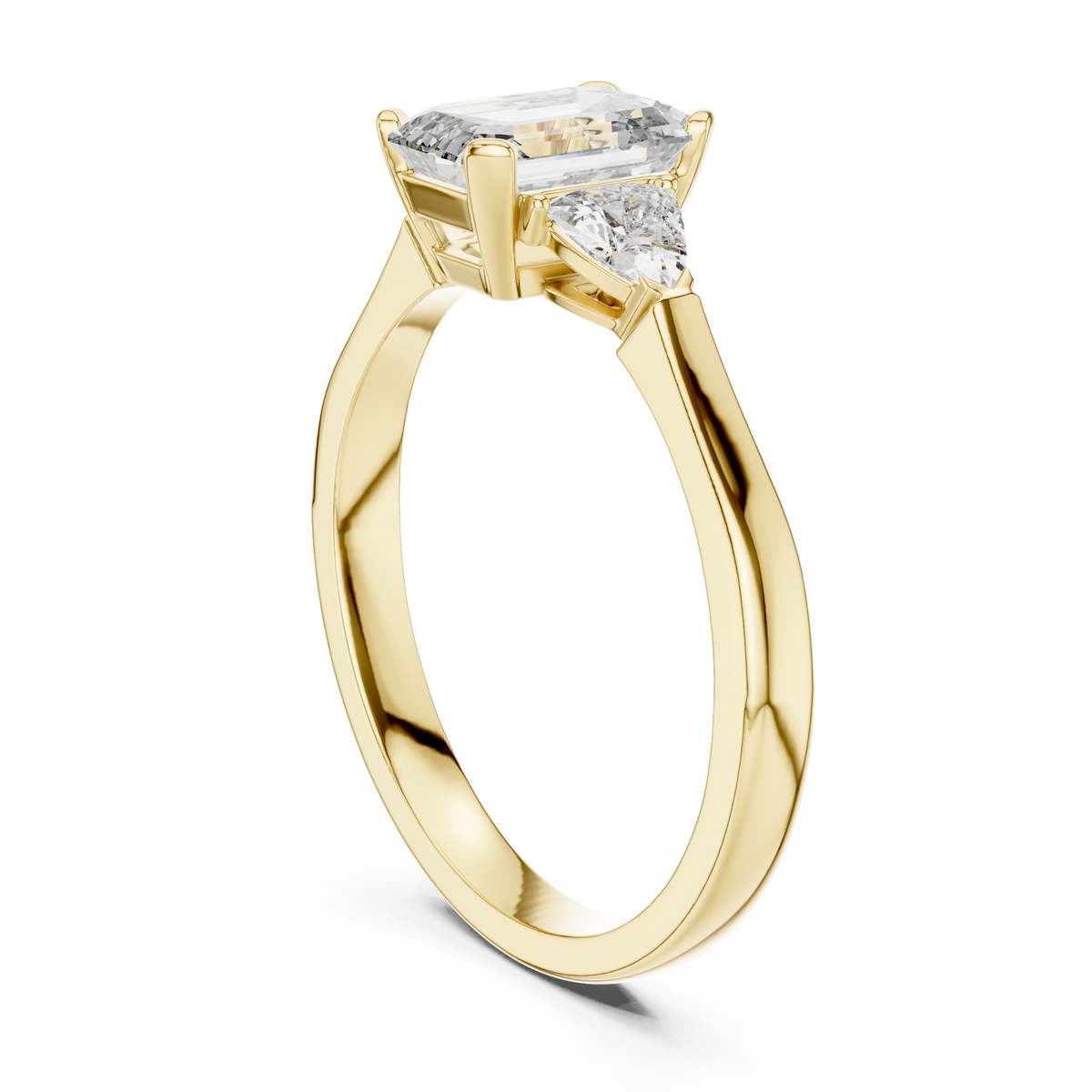 Soft natural studio lighting capturing the warmth of the 14K Gold metal and the clarity of the emerald and trillion cut lab grown diamonds for high resolution online browsing

