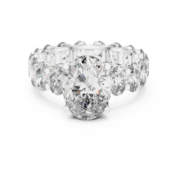 Top down birds eye view detailing the symmetry of the center 11x8mm oval lab diamond along with 16 perfectly matched 5x3.5mm oval accent diamonds set systematically around the gold band in collet settings for maximum sparkle.

