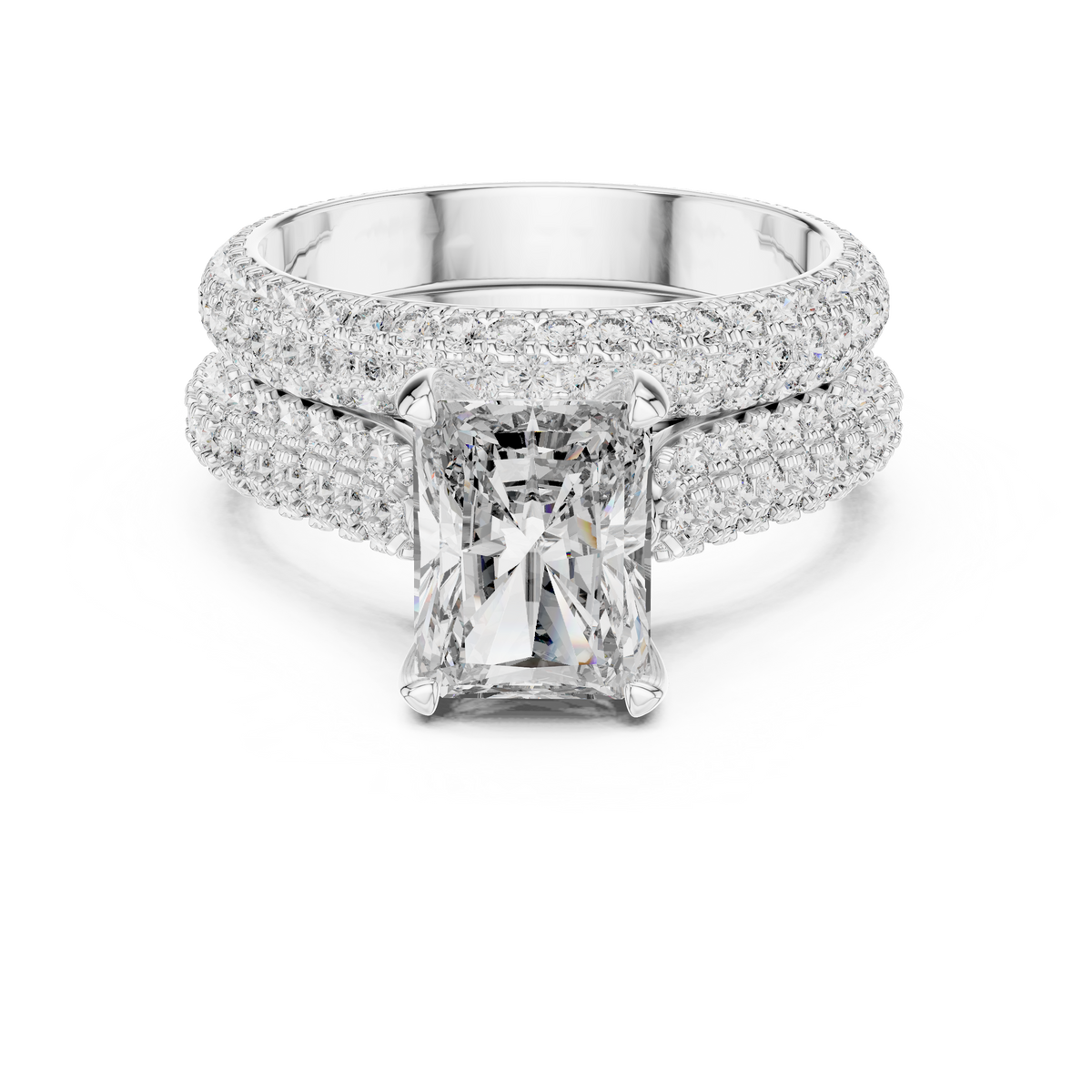 Top down flat lay photo of the radiant cut lab grown diamond solitaire ring resting gracefully on a white luxury velvet ring box, emphasizing the full pave shank structure and high polish finish of the fine gold mount.

